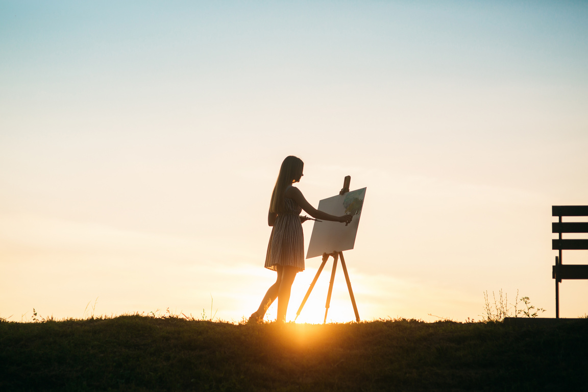 Girl Painting Outdoors
