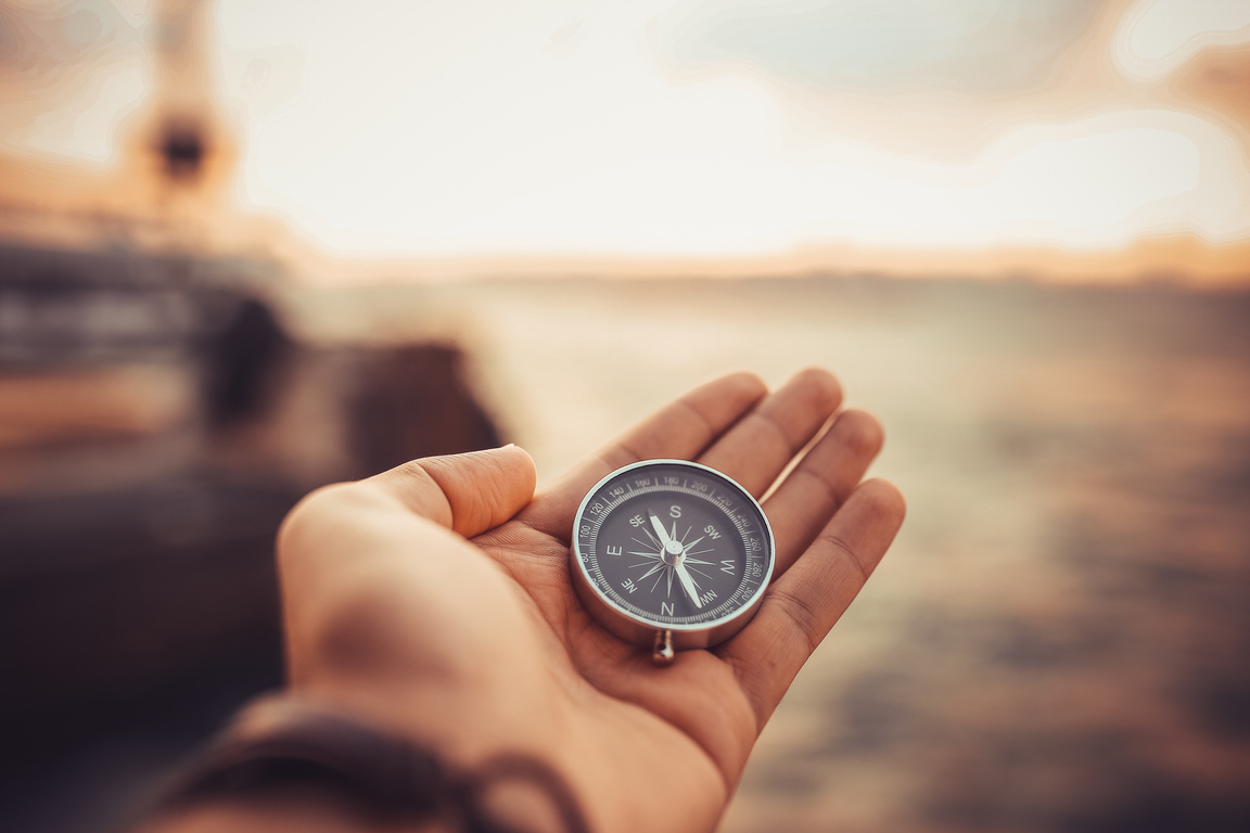 Compass on hand